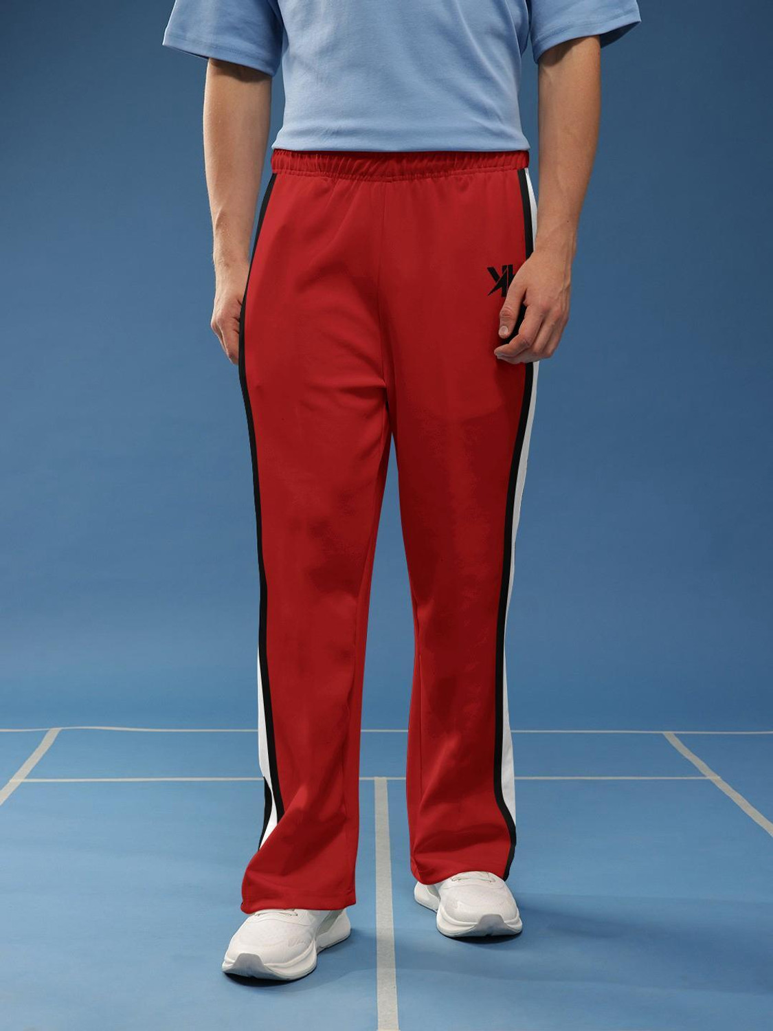 Image of WARYAR Solid, Striped Men Red Track Pants