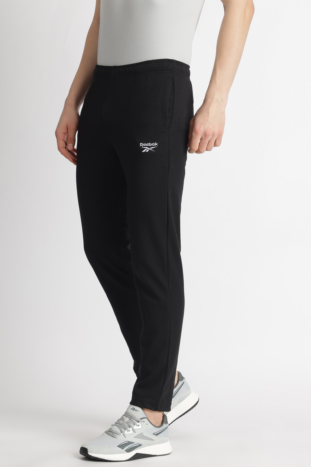Image of REEBOK Solid Men Black Track Pants