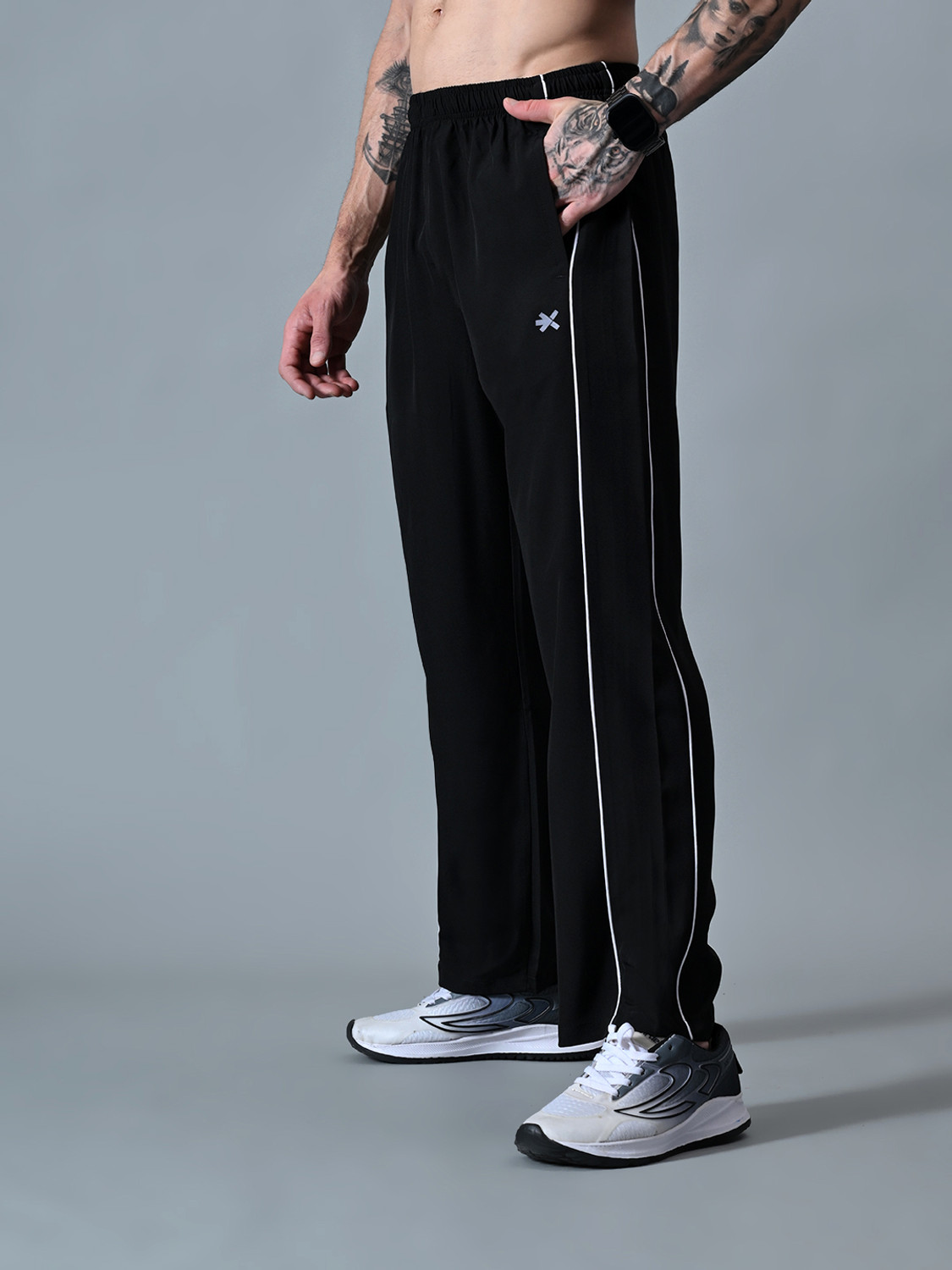 Image of HRX by Hrithik Roshan Striped Men Black Track Pants