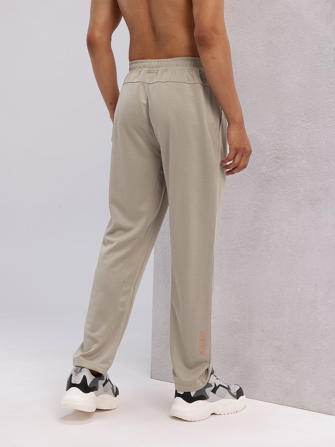 Image of HRX by Hrithik Roshan Solid Men Beige Track Pants