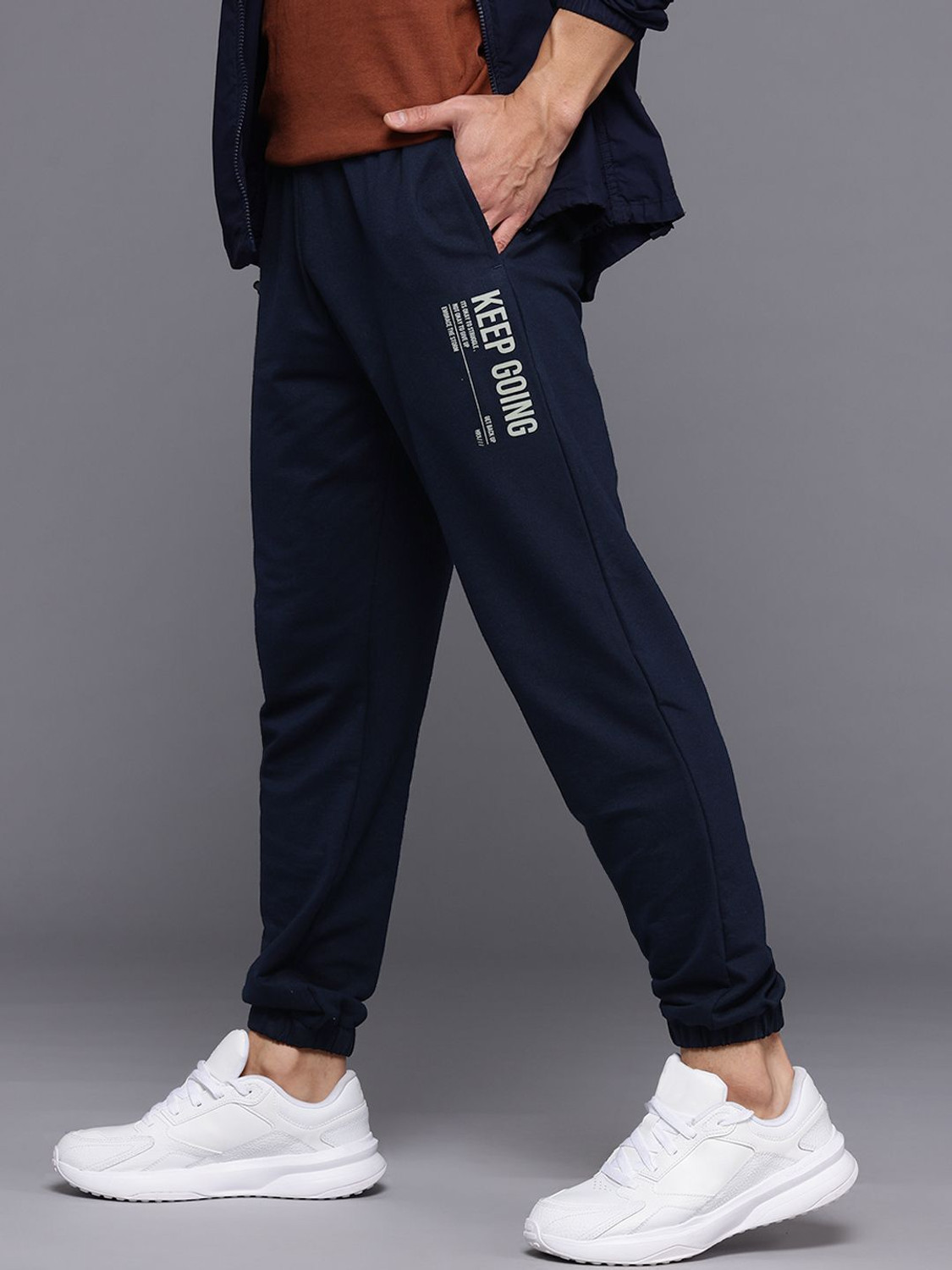 Image of HRX by Hrithik Roshan Solid Men Blue Track Pants