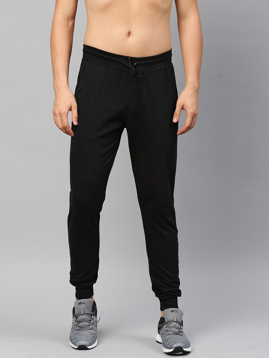 Image of HRX by Hrithik Roshan Solid Men Black Track Pants