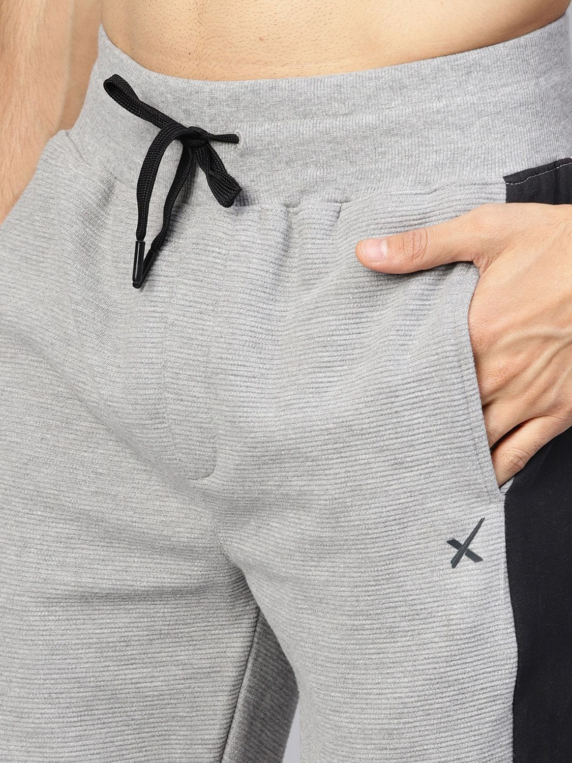 Image of HRX by Hrithik Roshan Colorblock Men Grey Track Pants