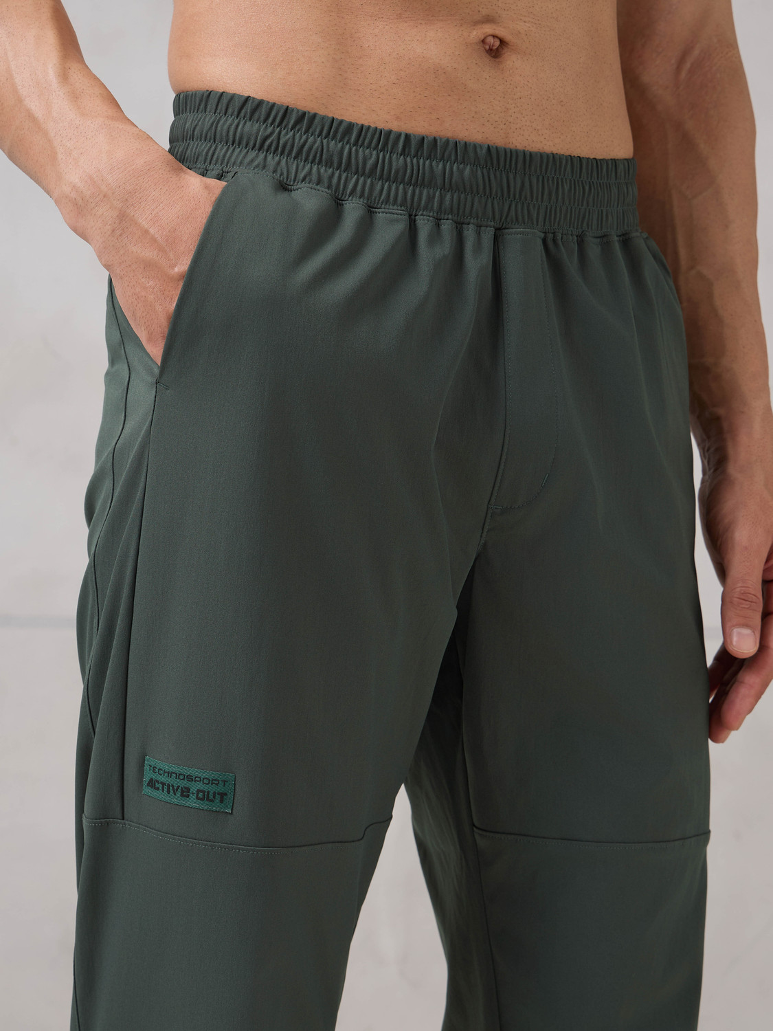 Image of TECHNOSPORT Solid Men Green Track Pants