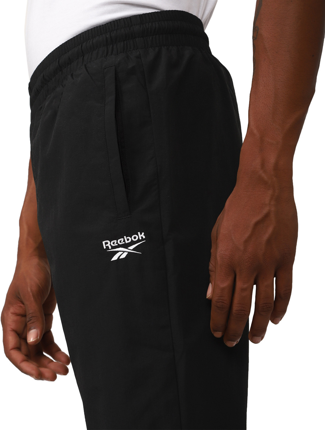 Image of REEBOK Solid Men Black Track Pants