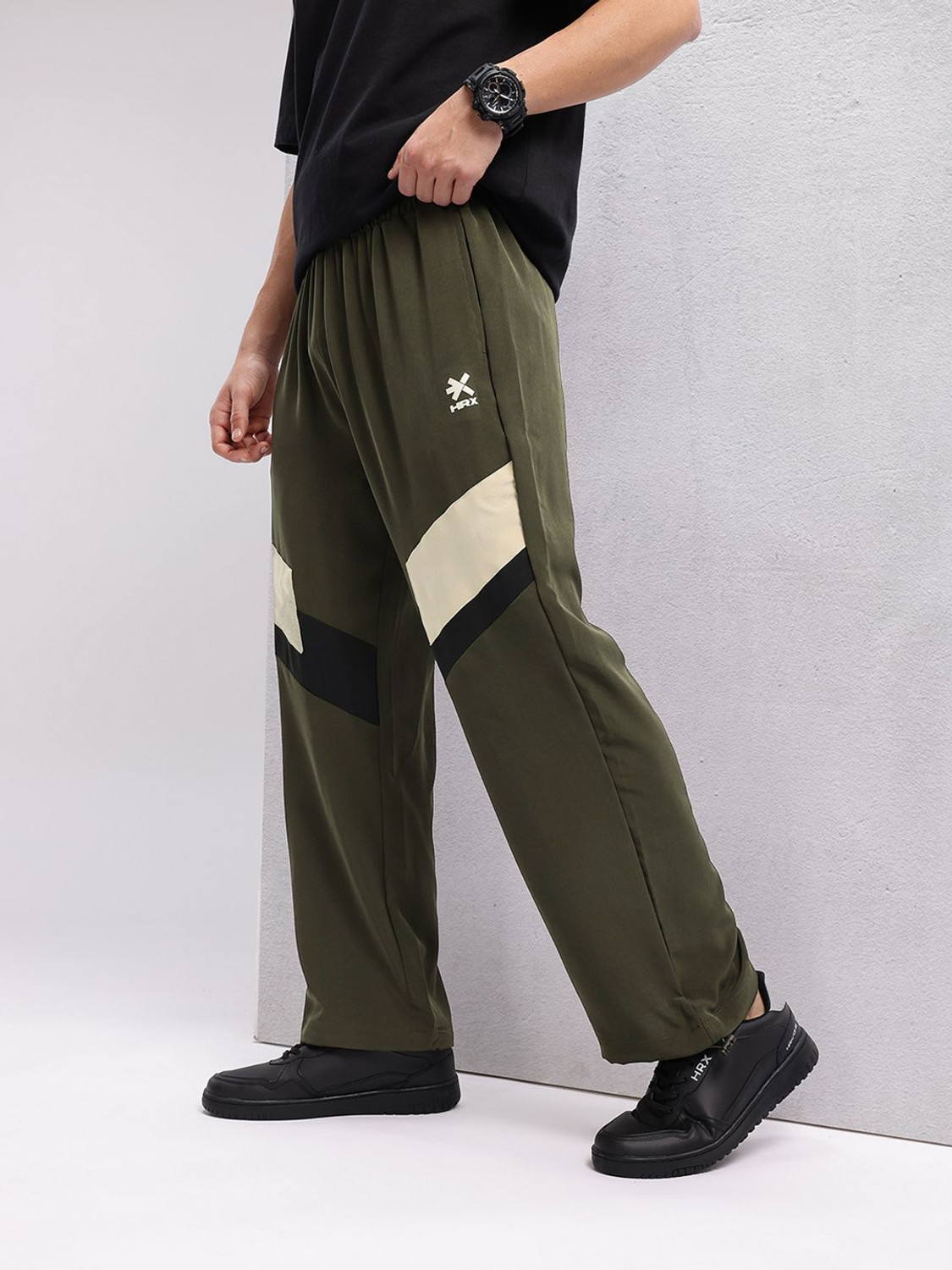 Image of HRX by Hrithik Roshan Solid Men Green Track Pants