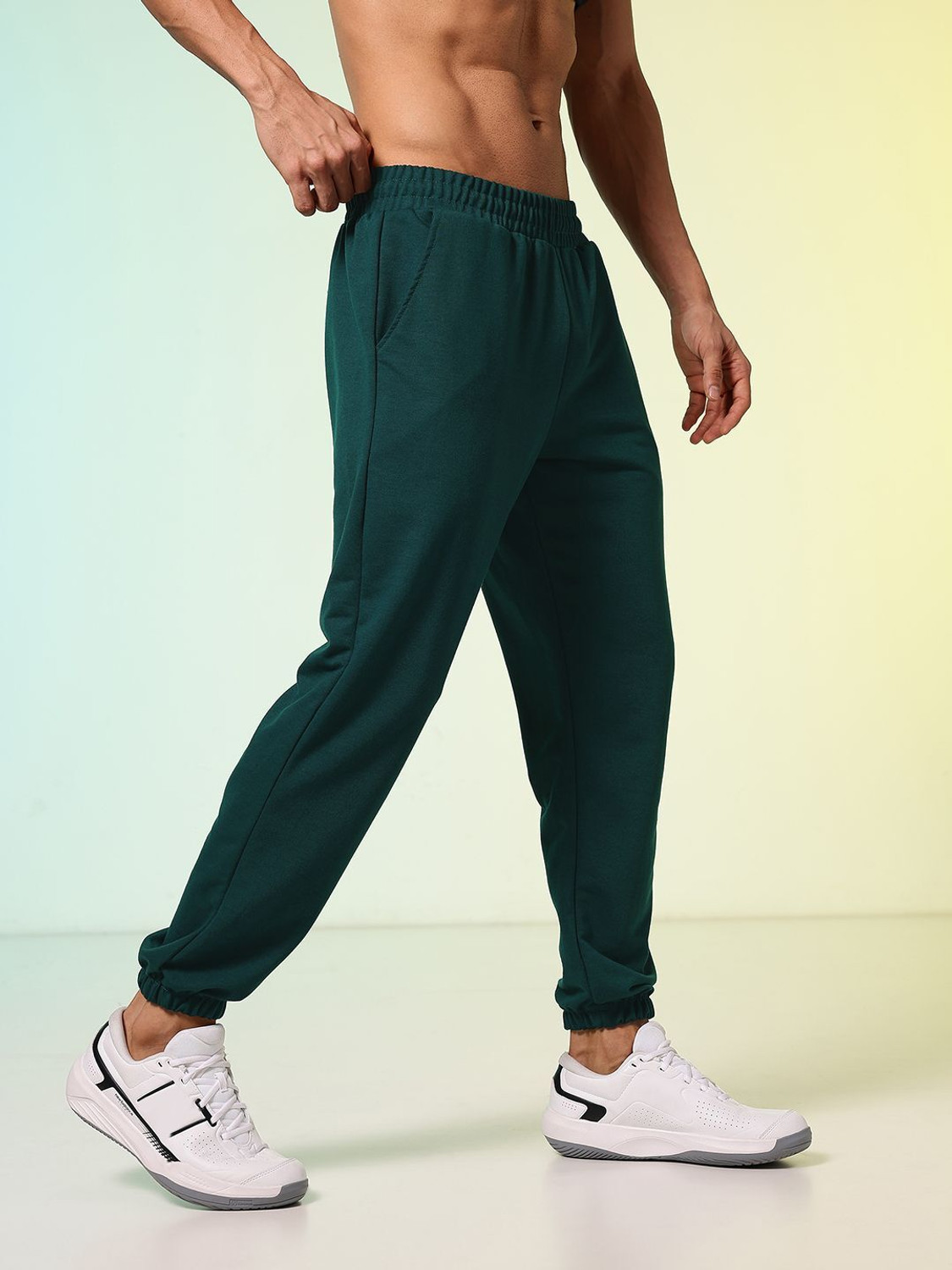 Image of HRX by Hrithik Roshan Solid Men Green Track Pants