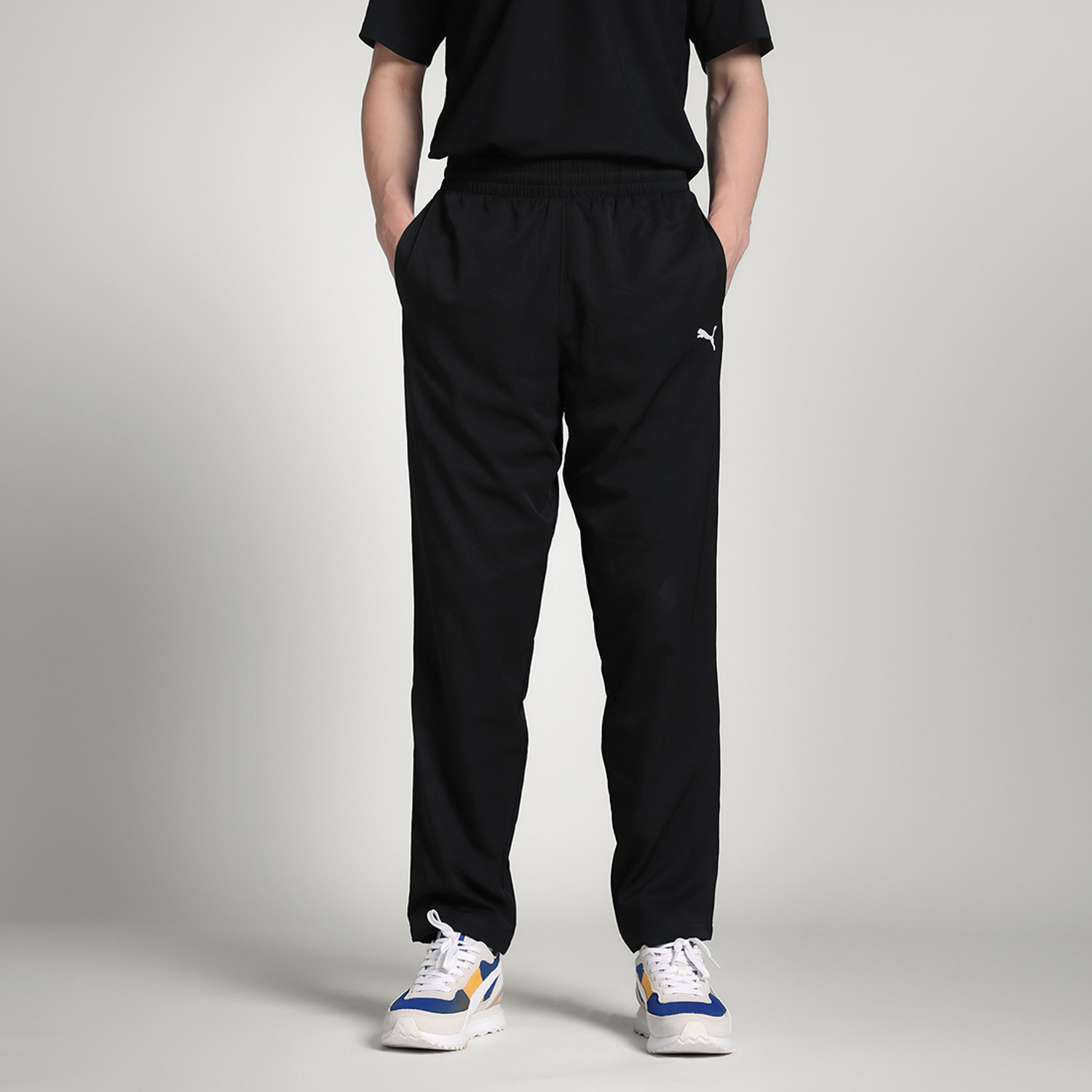 Image of PUMA Solid Men Black Track Pants