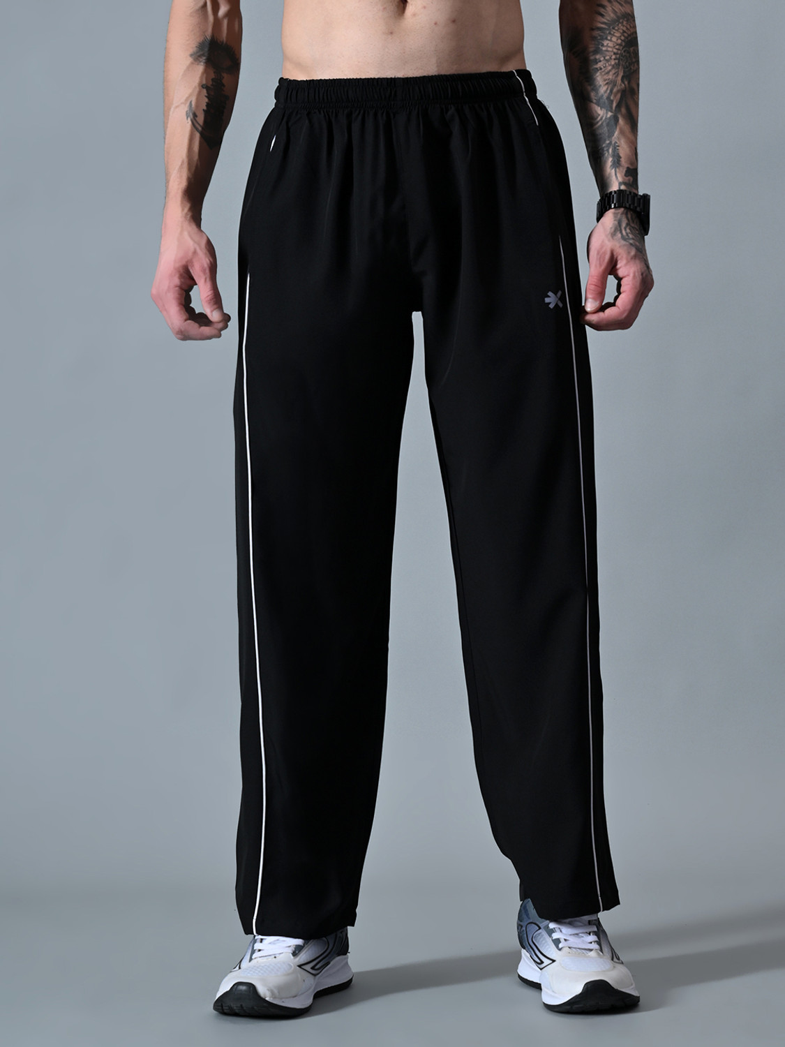 Image of HRX by Hrithik Roshan Striped Men Black Track Pants