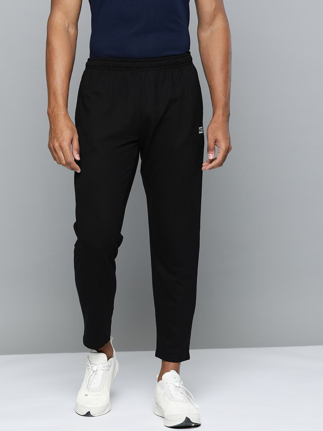 Image of HRX by Hrithik Roshan Men Solid Black Track Pants