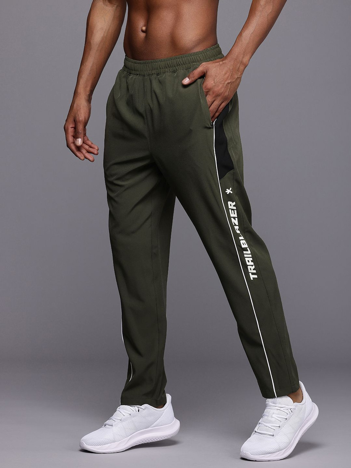 Image of HRX by Hrithik Roshan Striped Men Green Track Pants