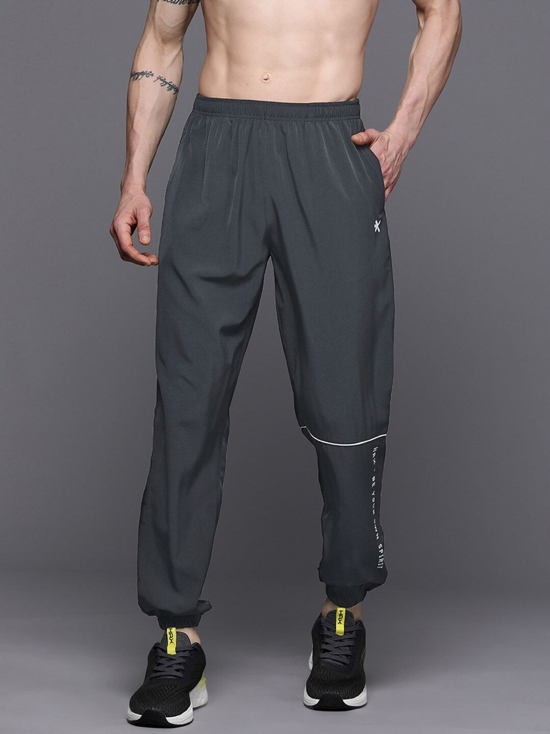 Image of HRX by Hrithik Roshan Solid Men Black Track Pants