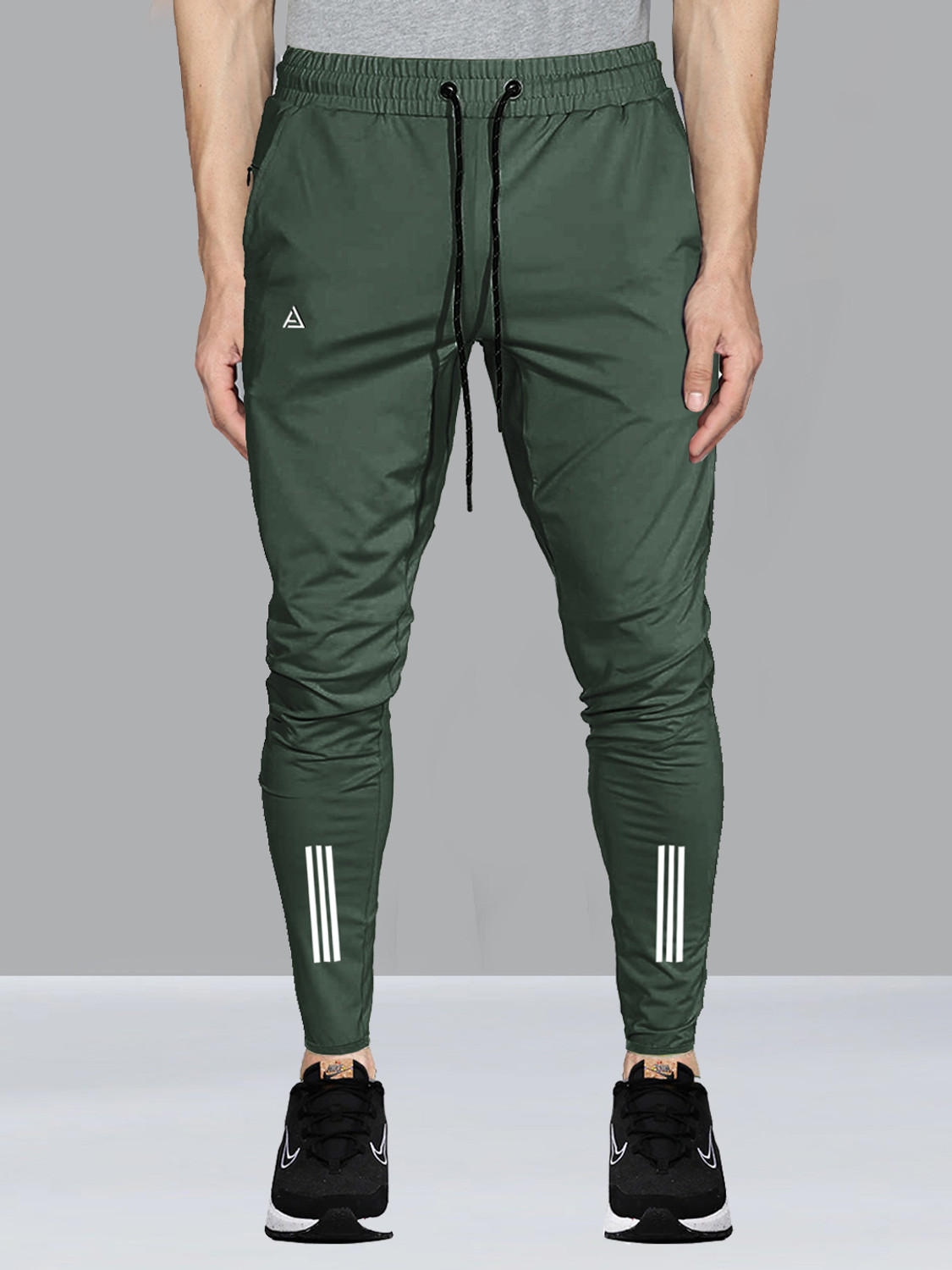 Image of AVOLT Solid Men Dark Green Track Pants