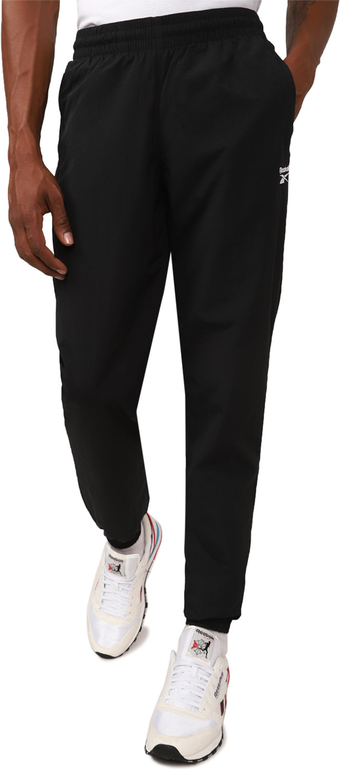 Image of REEBOK Solid Men Black Track Pants