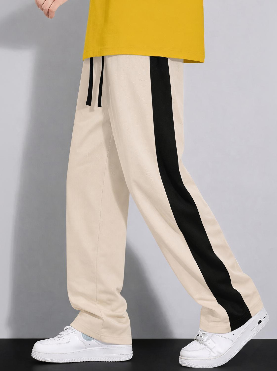 Image of COMBRAIDED Self Design Men Beige, Black Track Pants