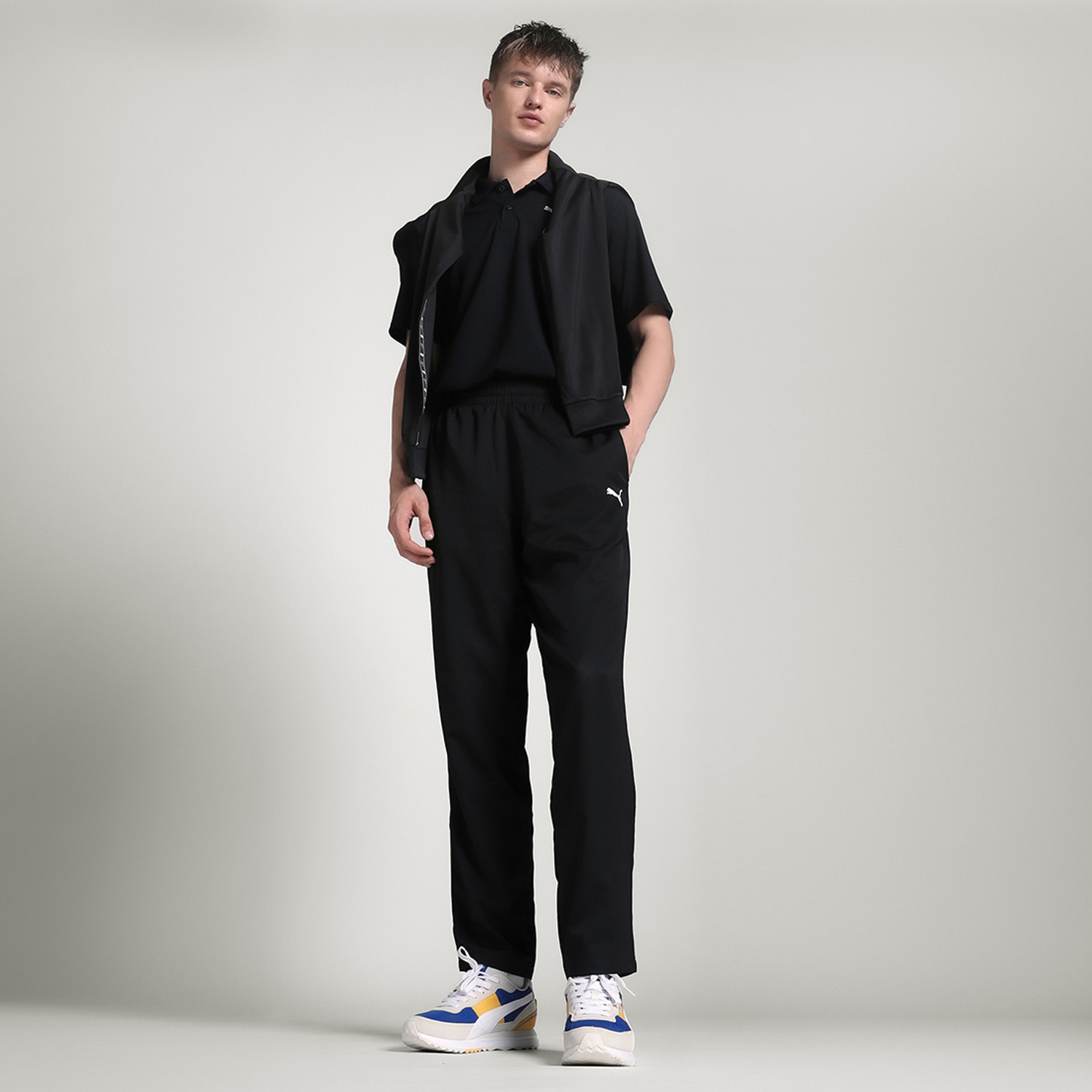 Image of PUMA Solid Men Black Track Pants
