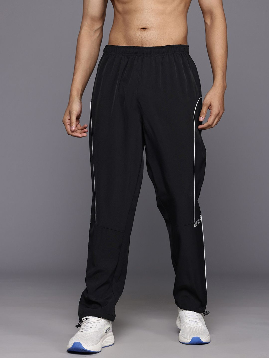 Image of HRX by Hrithik Roshan Solid Men Black Track Pants