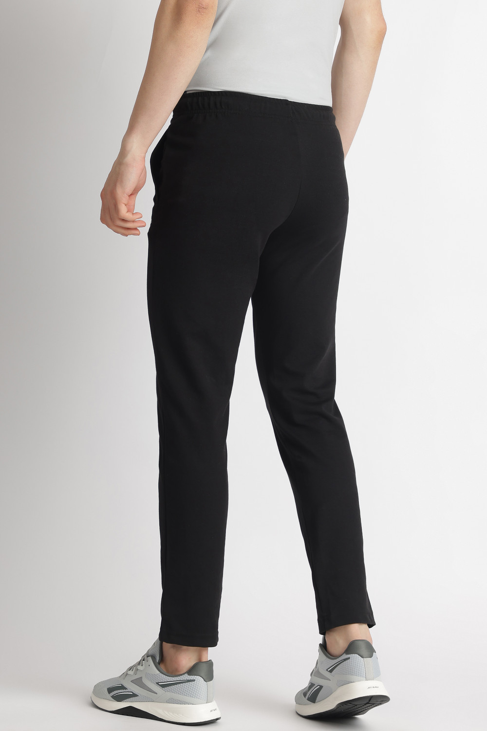Image of REEBOK Solid Men Black Track Pants