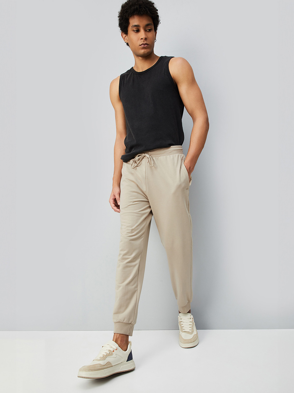 Image of MAX Solid Men Beige Track Pants