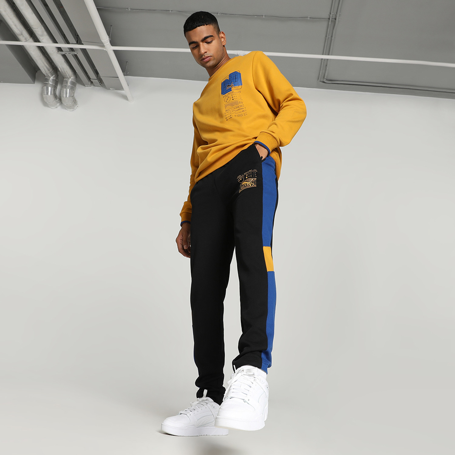 Image of PUMA Solid Men Black Track Pants
