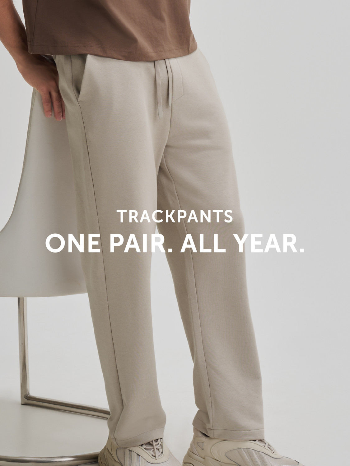 Image of XYXX Solid Men Beige Track Pants