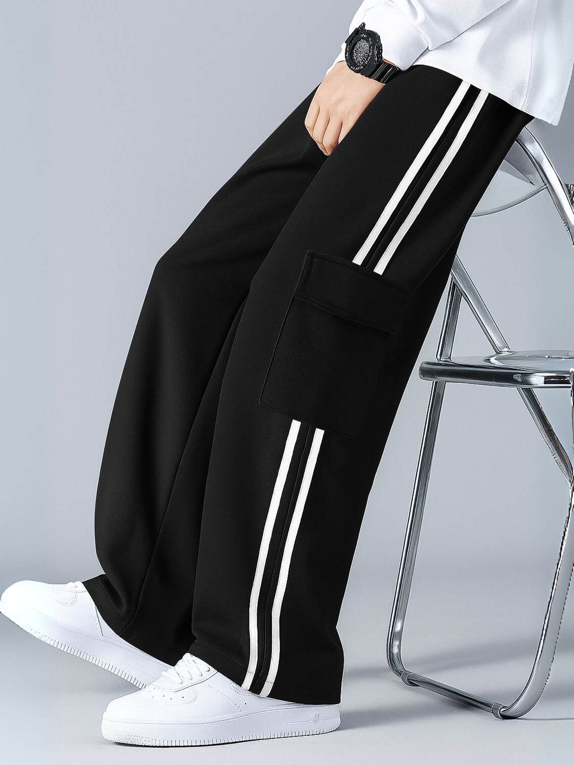 Image of COMBRAIDED Solid Men Black Track Pants