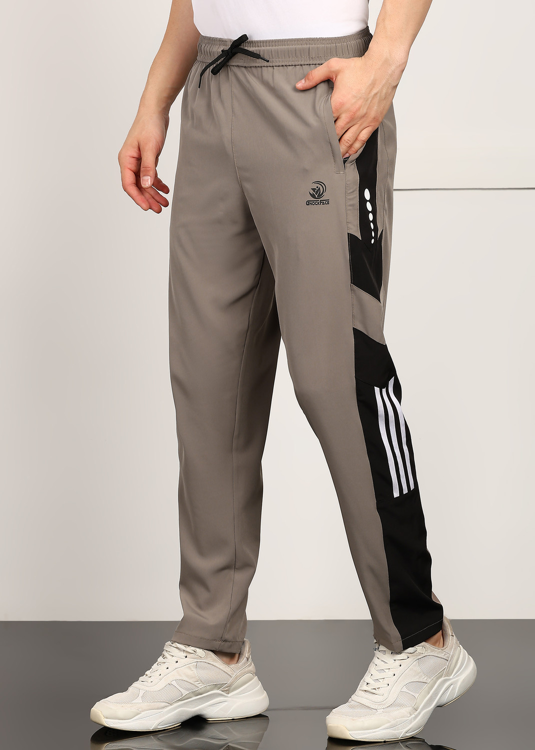 Image of GNOCKFACE Printed, Self Design Men Brown Track Pants