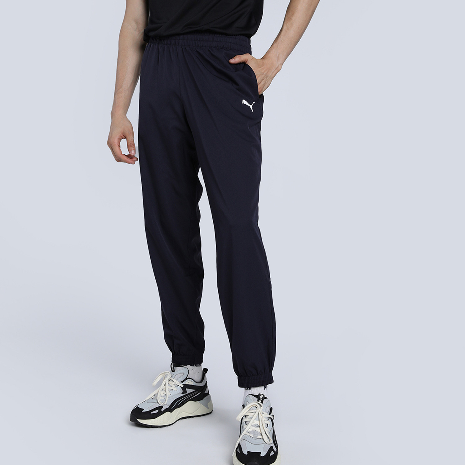 Image of PUMA Solid Men Blue Track Pants
