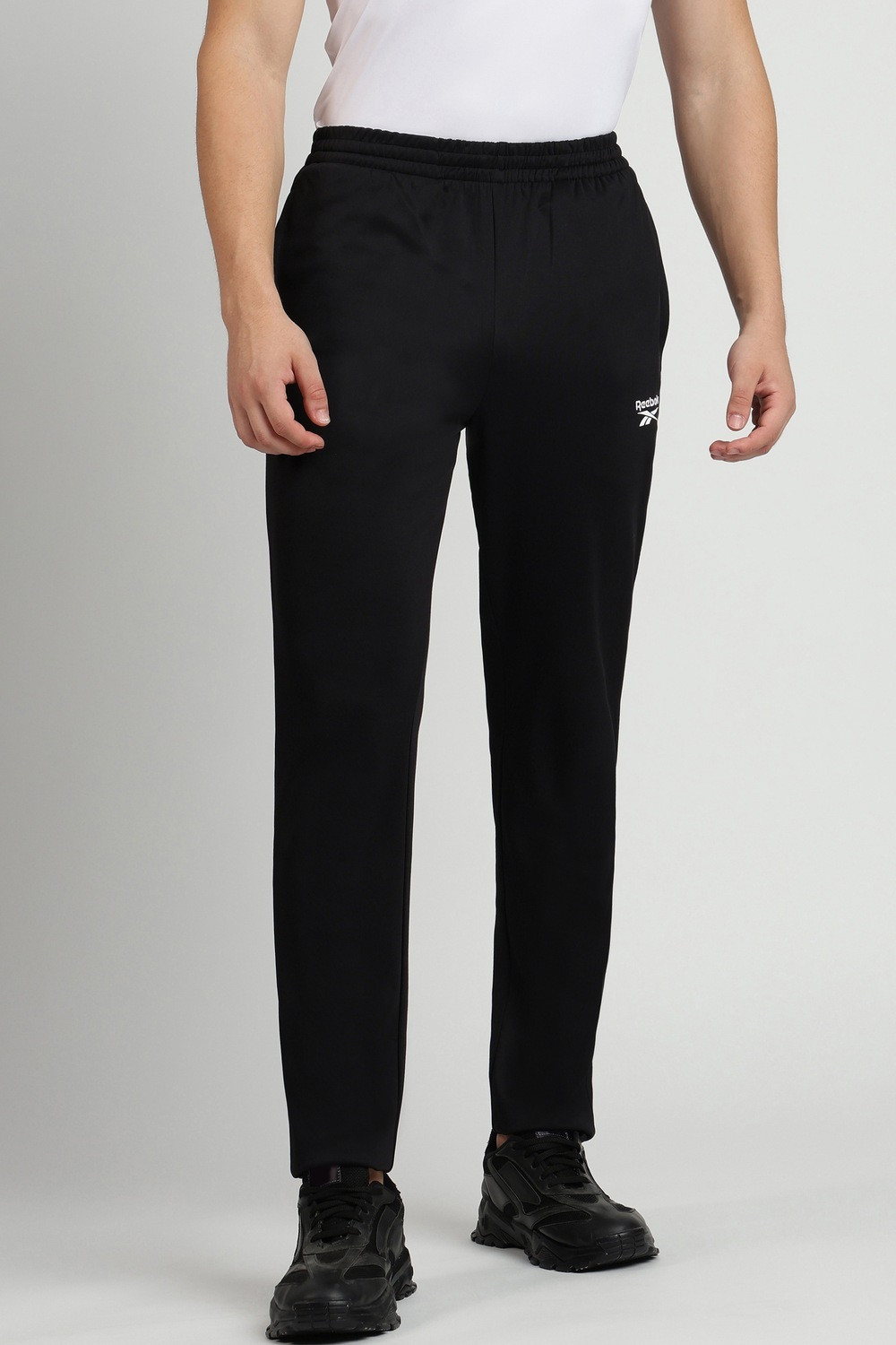 Image of REEBOK Solid Men Black Track Pants