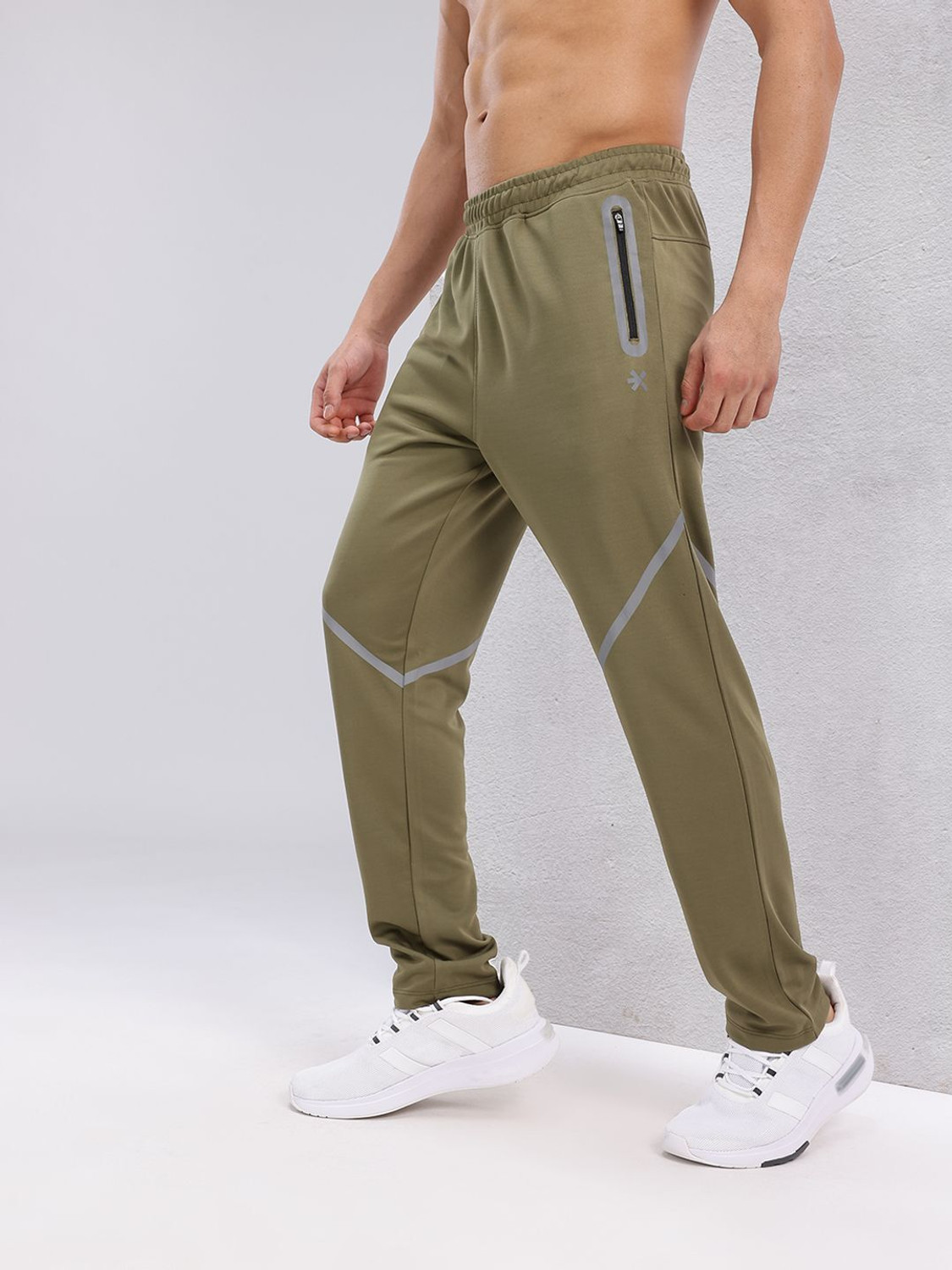 Image of HRX by Hrithik Roshan Solid Men Green Track Pants