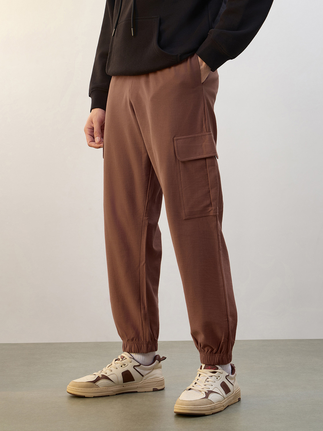 Image of NOBERO Solid Men Brown Track Pants