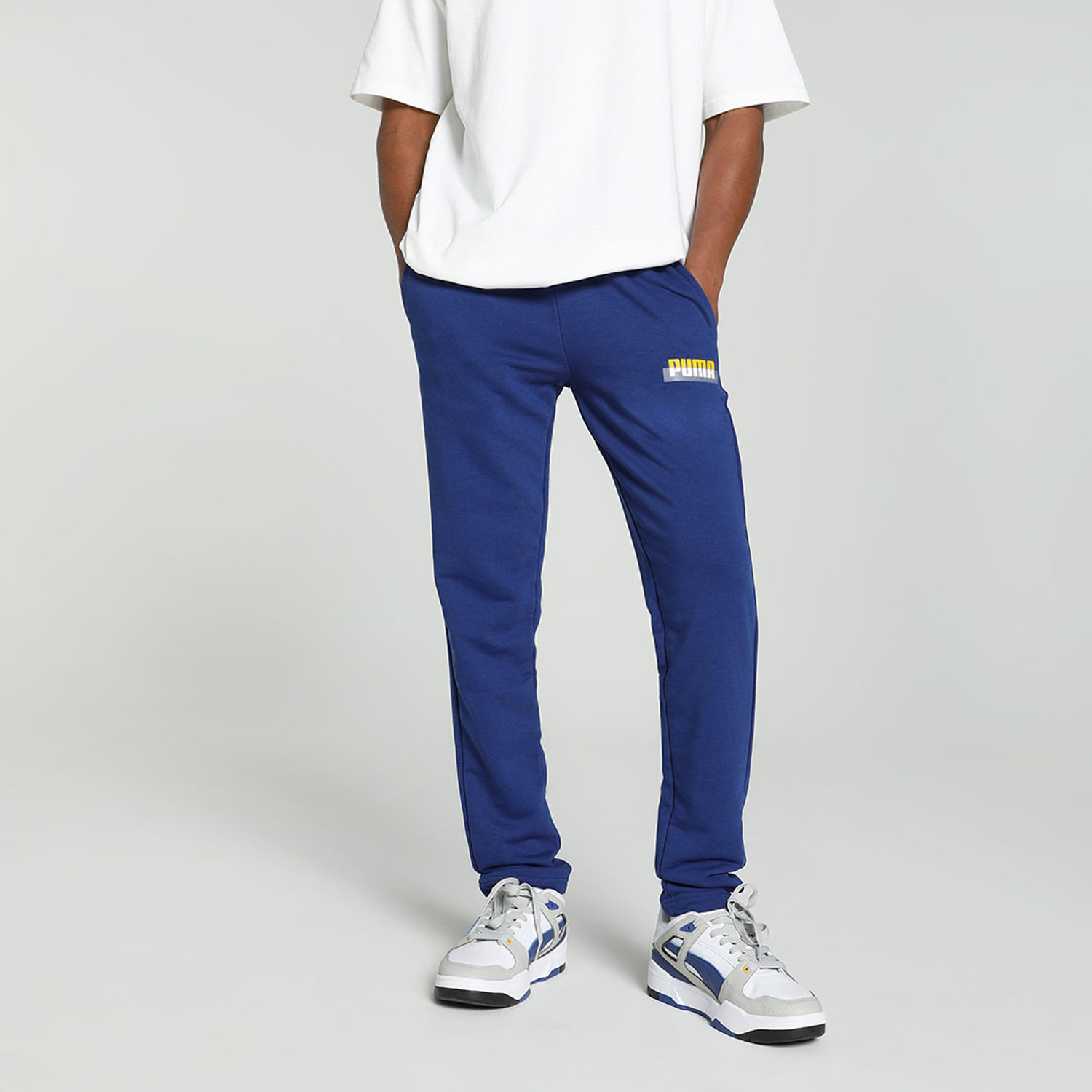 Image of PUMA Solid Men Blue Track Pants