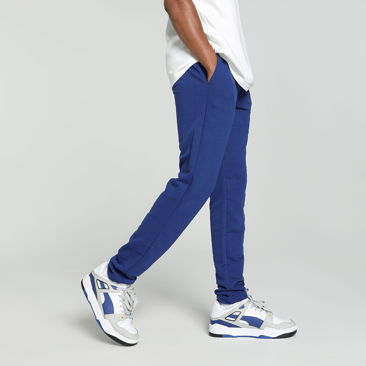 Image of PUMA Solid Men Blue Track Pants