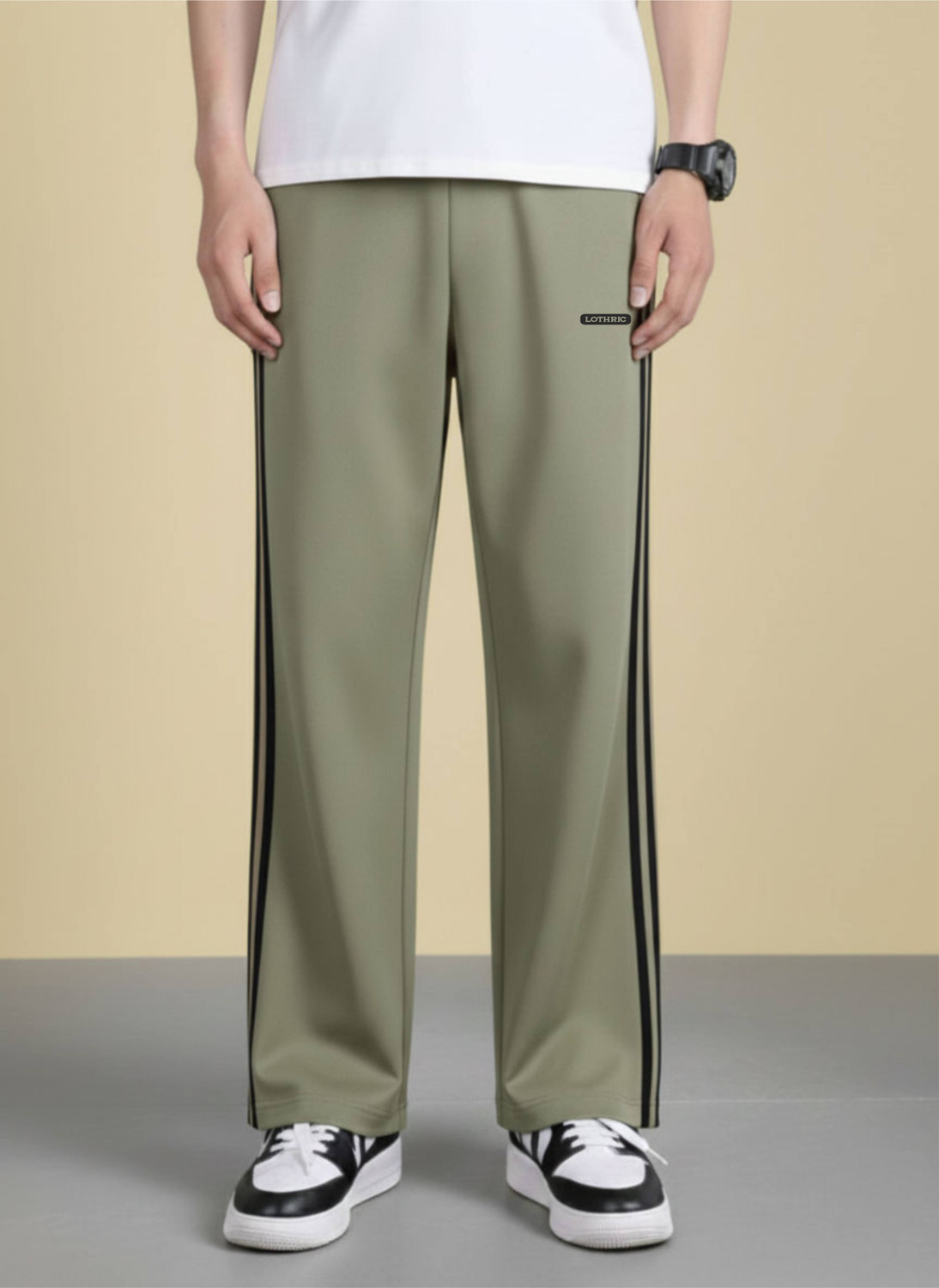 Image of LOTHRIC Striped Men Green Track Pants