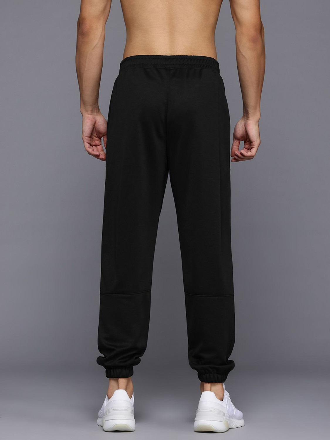 Image of HRX by Hrithik Roshan Solid Men Black Track Pants