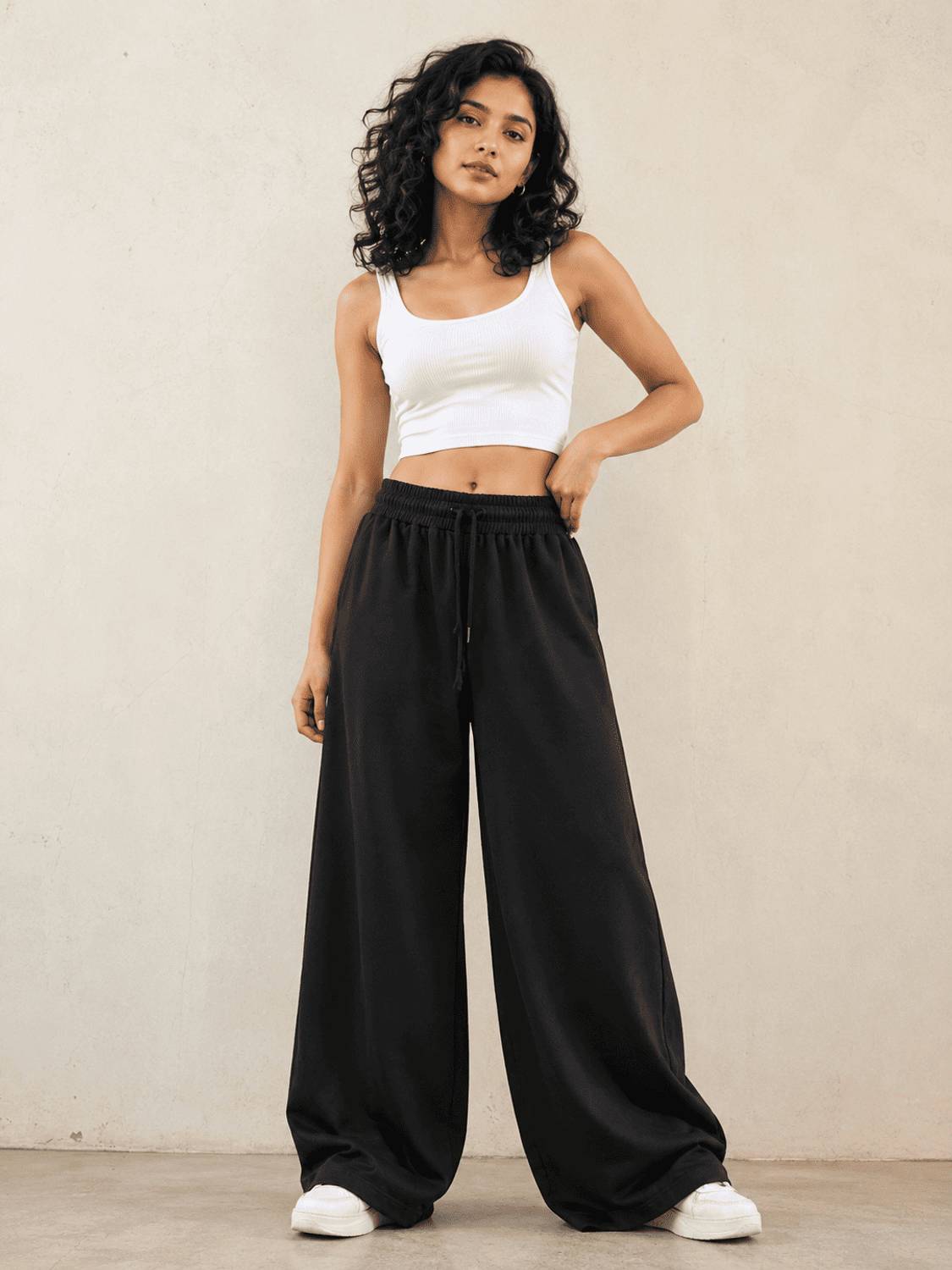 Kavya Women Black Loose Fit Trousers - Image 1