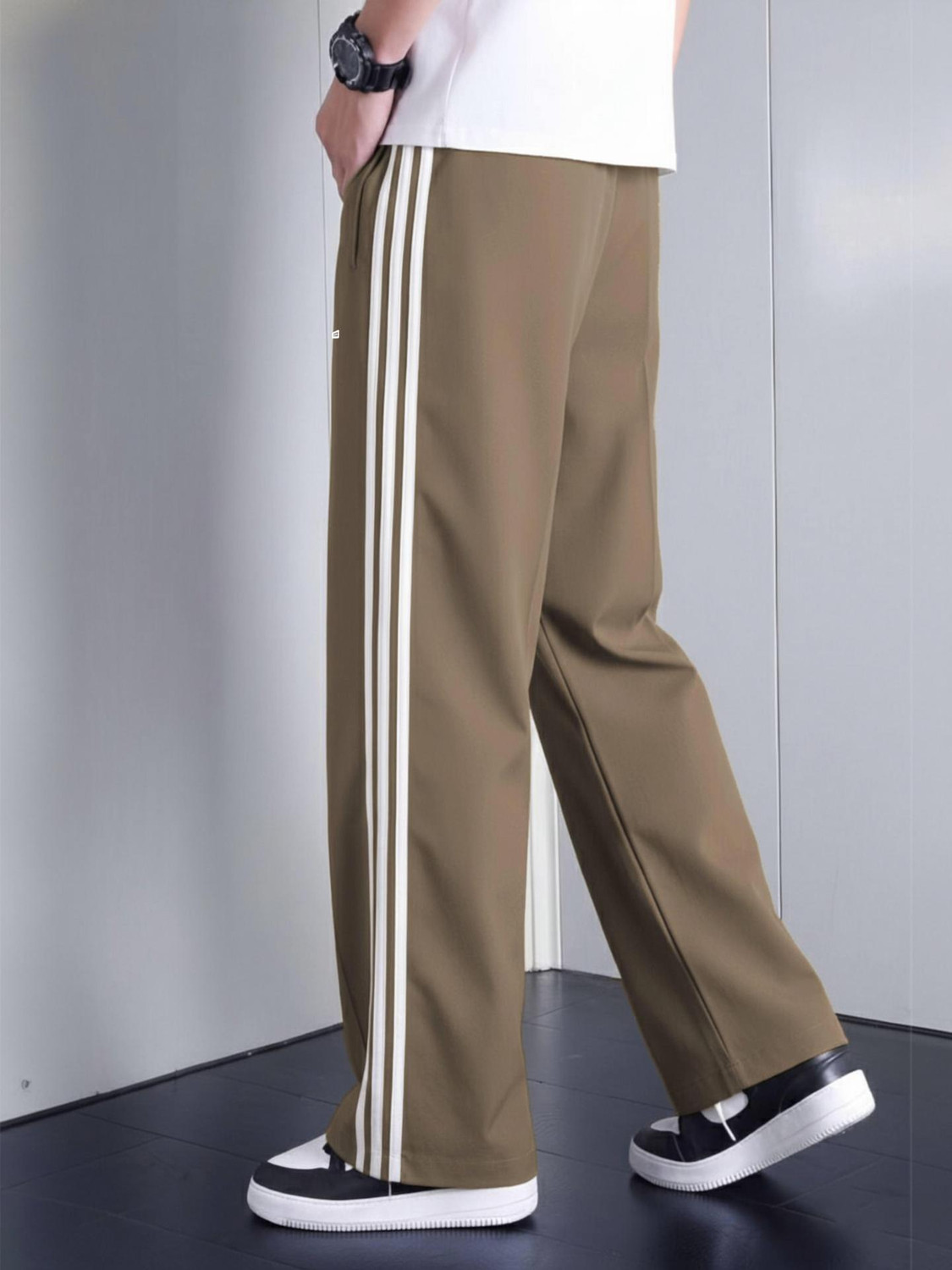 Image of LOTHRIC Striped Men Brown Track Pants