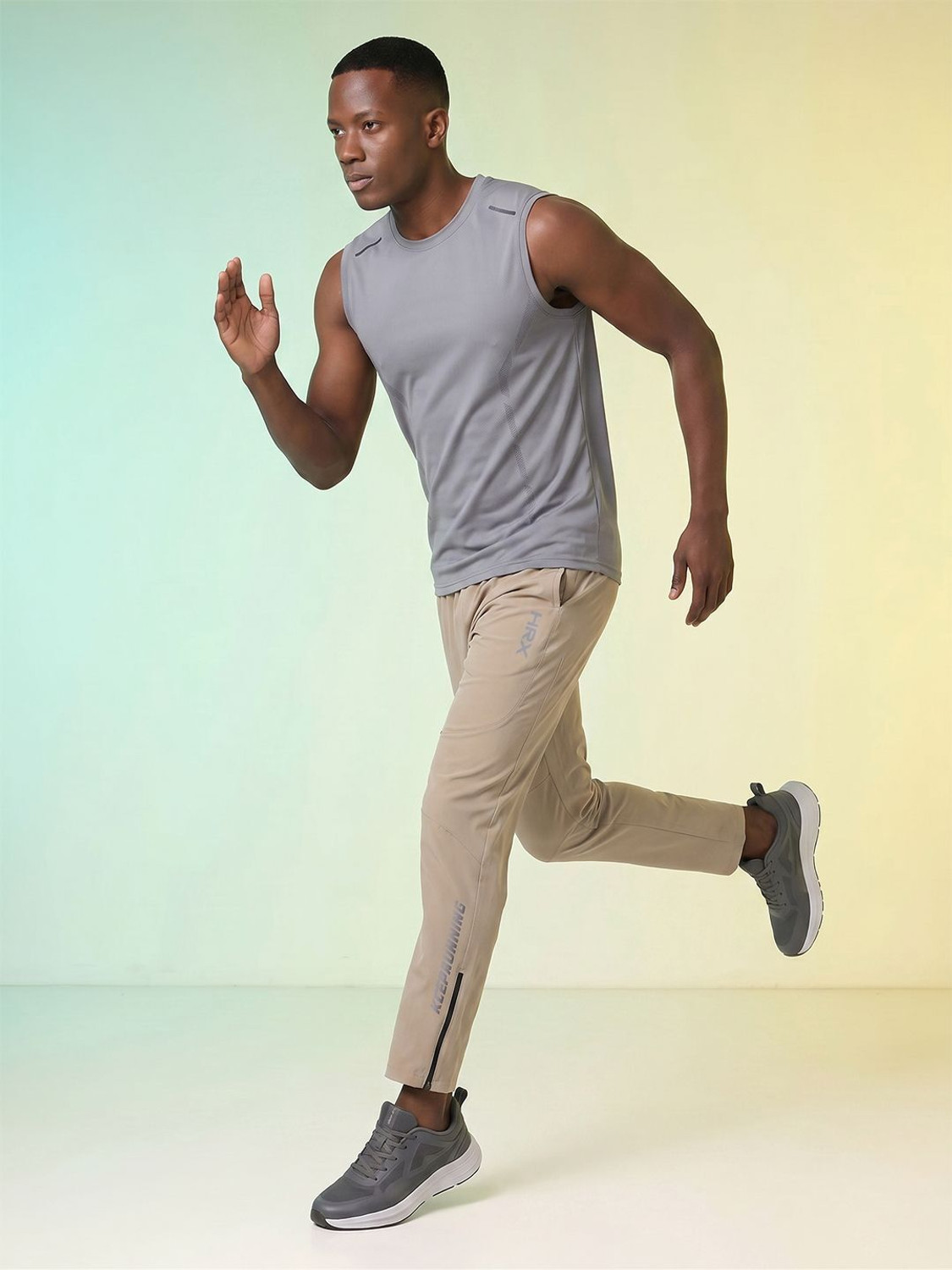 Image of HRX by Hrithik Roshan Men Self Design Beige Track Pants