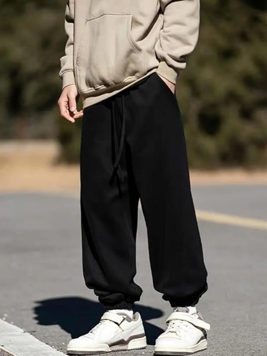 Image of Pricha Solid Men Black Track Pants
