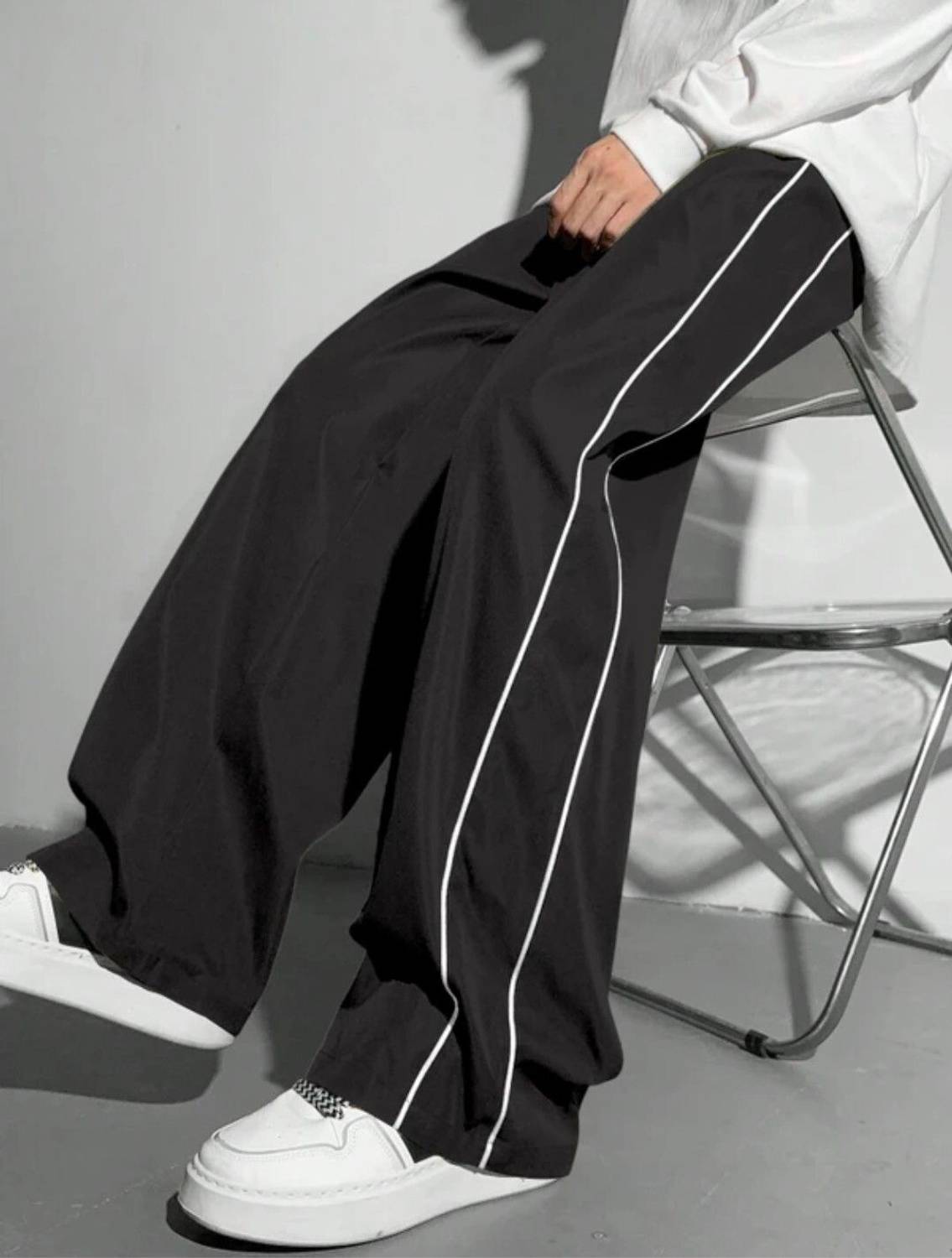 ColorMeGorgeous Men Black Striped Track Pants - Image 1