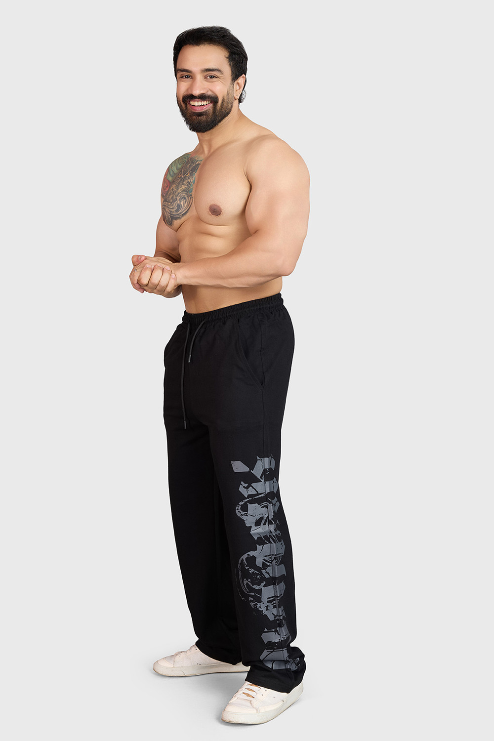 Image of FuaarK Graphic Print Men Black Track Pants