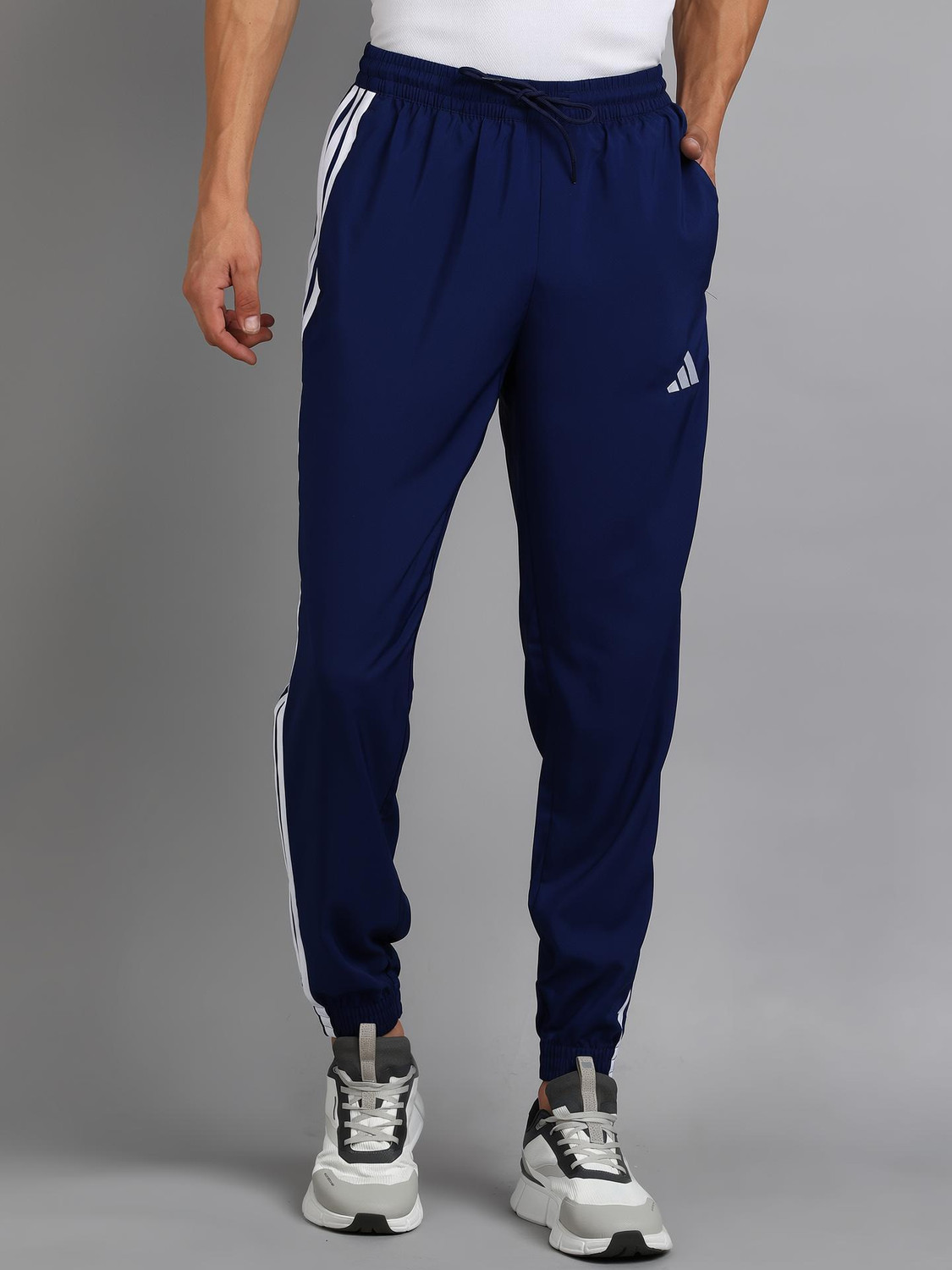 Image of ADIDAS Men Striped Blue Track Pants