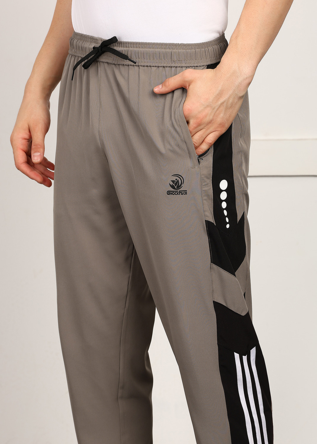 Image of GNOCKFACE Printed, Self Design Men Brown Track Pants