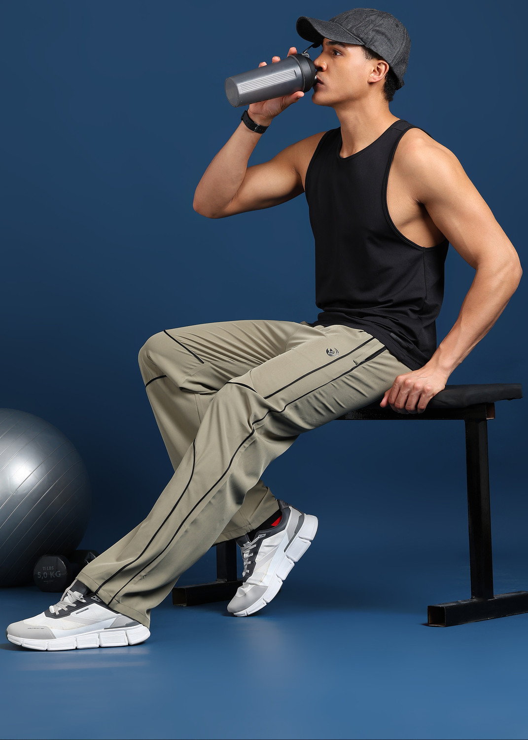 Image of GNOCKFACE Men Striped Beige Track Pants