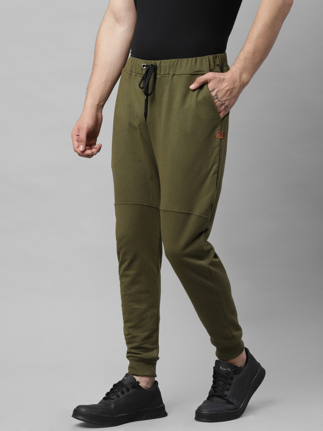 Image of RIGO Solid Men Green Track Pants