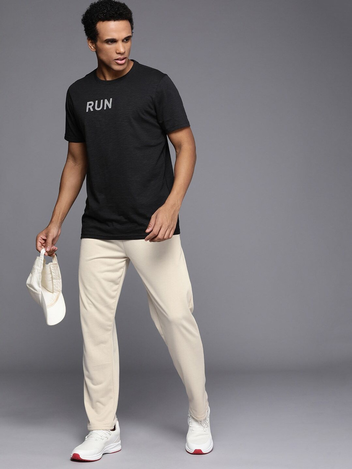 Image of HRX by Hrithik Roshan Self Design Men Gold Track Pants