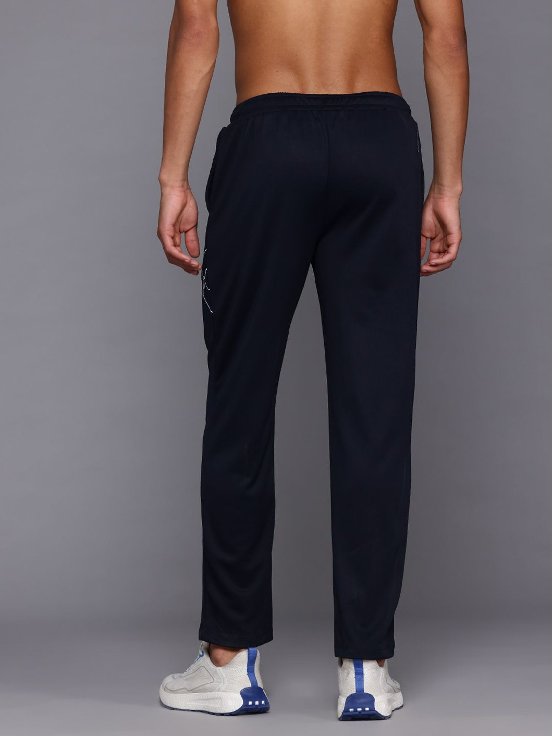 Image of HRX by Hrithik Roshan Striped Men Blue Track Pants