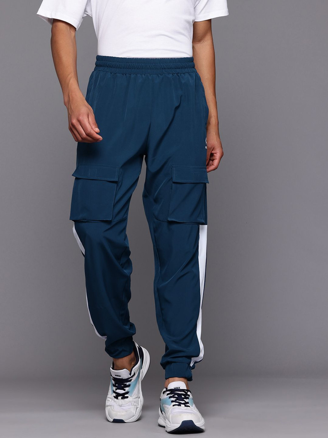 Image of HRX by Hrithik Roshan Solid Men Blue Track Pants