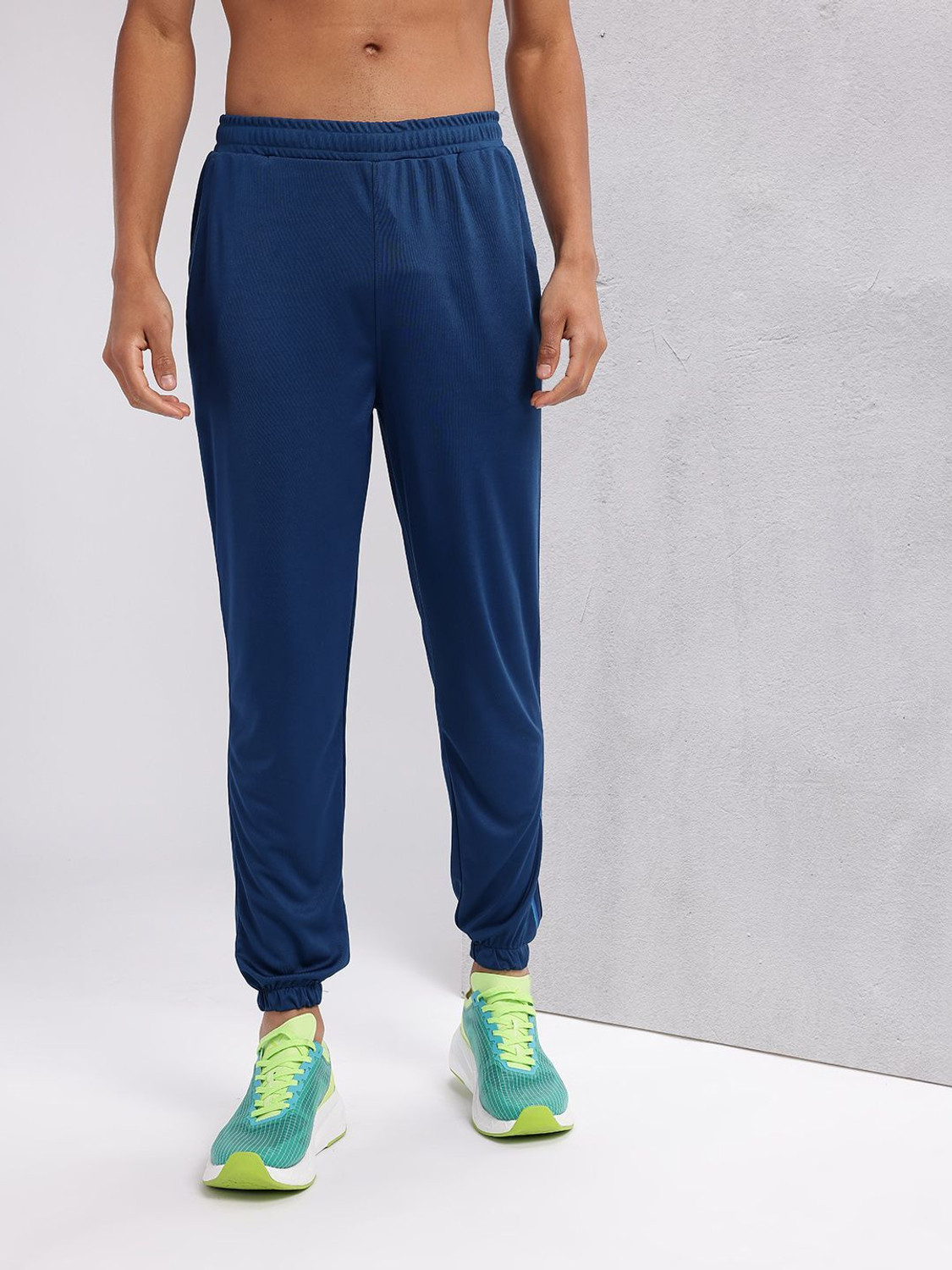 Image of HRX by Hrithik Roshan Solid Men Blue Track Pants