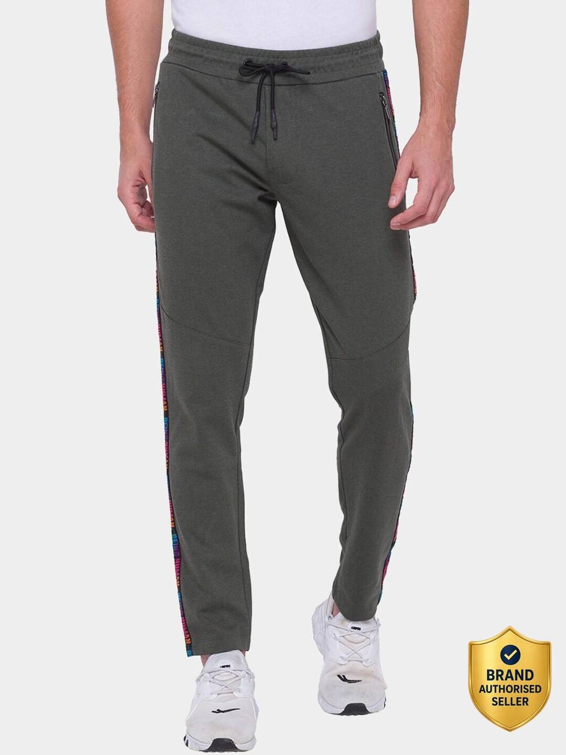 BEING HUMAN Forest Green Regular Fit Track Pants For Men By Being Human Clothing Solid Men Green Track Pants